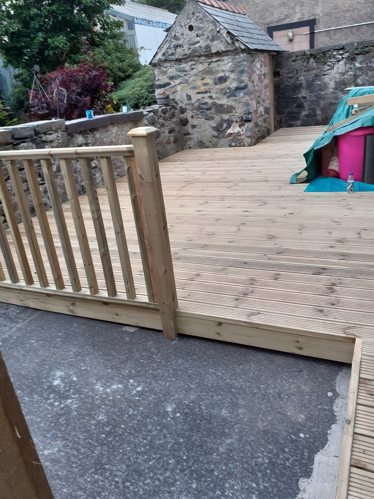 Wooden patio timber deck with timber balustrade railings in Anglesey